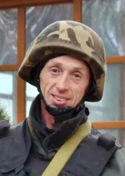 Ivan Zubkov smiling in a helmet and body armor